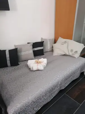 Letto o letti in una camera di benvenuti a sud 3