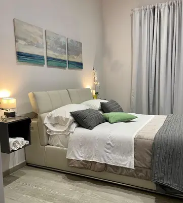 Letto o letti in una camera di BeBaSu