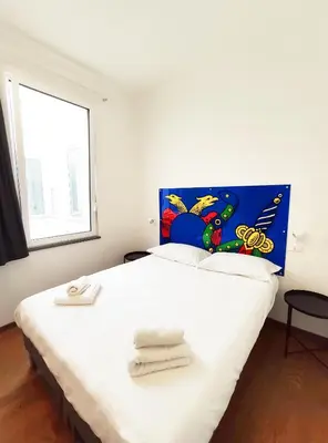 Letto o letti in una camera di Tric Trac Hostel