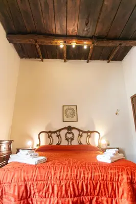Letto o letti in una camera di San Gennaro B&B