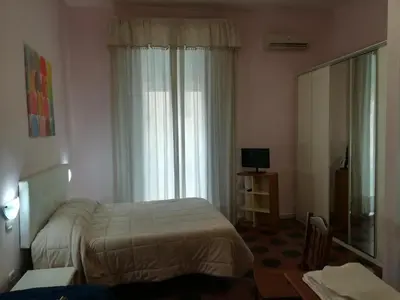 Letto o letti in una camera di Come D'Incanto A Napoli
