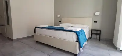 Letto o letti in una camera di Hi Relais Rooms