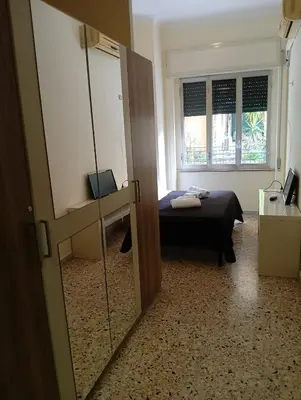 Letto o letti in una camera di B&B Sansevero Naples