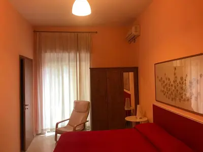 Letto o letti in una camera di B&B Sansevero Naples