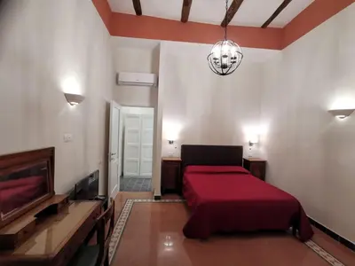 Letto o letti in una camera di Mergellina 121 Apartment's Rooms