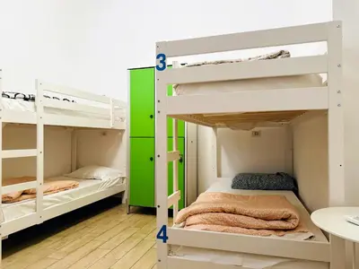 Letto o letti in una camera di Hostel Mancini Naples