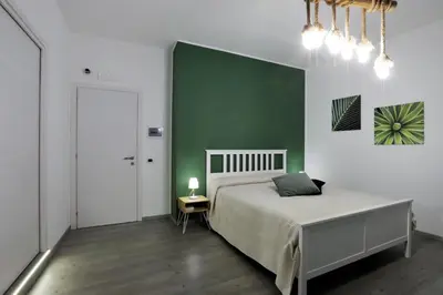 Letto o letti in una camera di Napoli Vesuvio Apartments by Dimorra