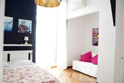 Letto o letti in una camera di Magia di Napoli