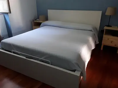 Letto o letti in una camera di CASA MARGHERITA