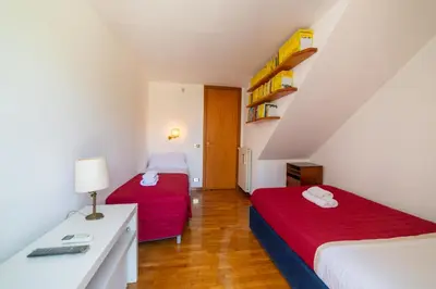 Letto o letti in una camera di The Port'Alba Apartment By HouseinNaples