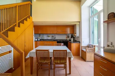 Cucina o angolo cottura di The Port'Alba Apartment By HouseinNaples