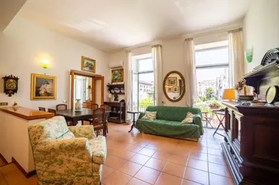 Area soggiorno di The Port'Alba Apartment By HouseinNaples