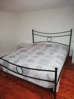 Letto o letti in una camera di Aurora Apartment nel cuore di Napoli