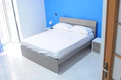 Letto o letti in una camera di La casa su SpaccaNapoli