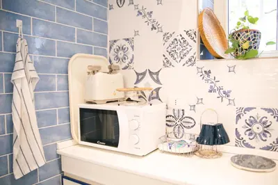 Cucina o angolo cottura di La casa del Nespolo, 2 terrazzi e 2 bagni in centro