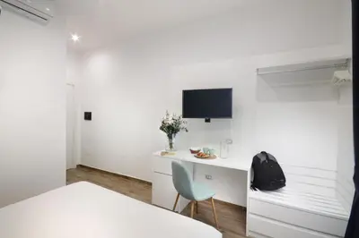 TV o dispositivi per l'intrattenimento presso Napoliseason Rooms & Breakfast