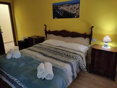 Letto o letti in una camera di Napoli Royal Suite