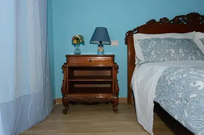 Letto o letti in una camera di Napoli Royal Suite