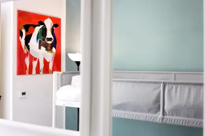 Letto o letti in una camera di GuestHost - La finestra su Garibaldi