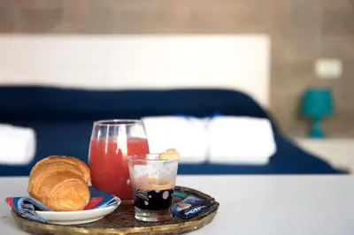 Letto o letti in una camera di Megaride Santa Lucia
