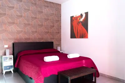 Letto o letti in una camera di Megaride Santa Lucia