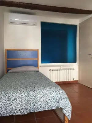 Letto o letti in una camera di MIDA HOUSE