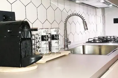 Cucina o angolo cottura di Bed&Coffee Napoli - Scarlatti