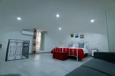 Letto o letti in una camera di A'CASA E' MAMMA'