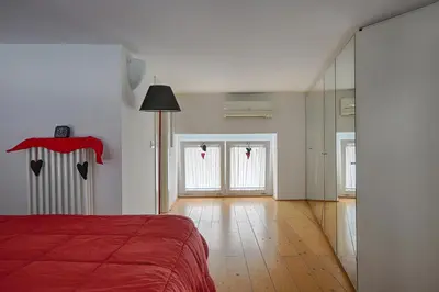 Letto o letti in una camera di MaMa Home