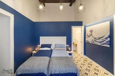 Letto o letti in una camera di Le Chiavi di Casa