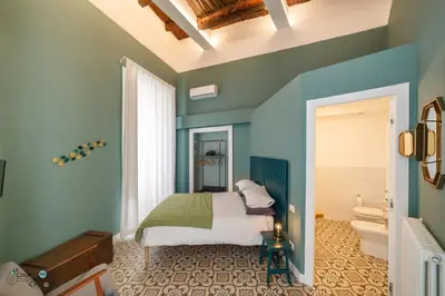 Letto o letti in una camera di Le Chiavi di Casa
