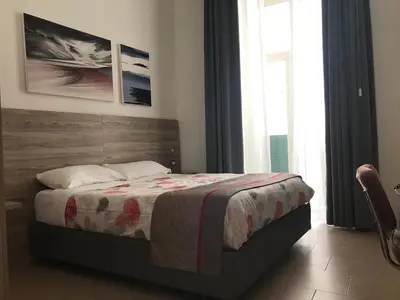 Letto o letti in una camera di 4STANZE