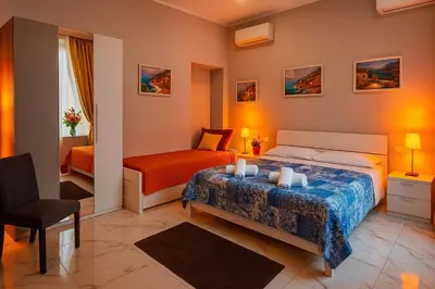 Letto o letti in una camera di San Gennaro in porta