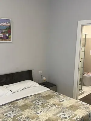 Letto o letti in una camera di San Gennaro in porta