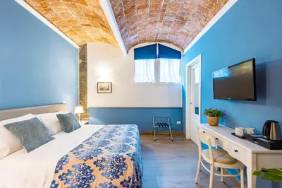 Letto o letti in una camera di Residenza Matilde