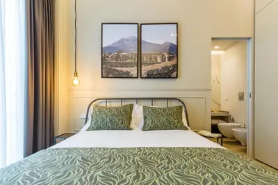 Letto o letti in una camera di B&B Civico 33