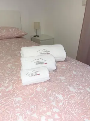Letto o letti in una camera di ChilometroZERO luxury apartment
