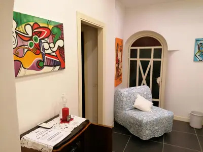Letto o letti in una camera di Casa Scialò Cuore di Napoli