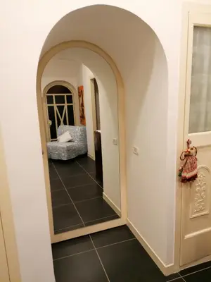 Letto o letti in una camera di Casa Scialò Cuore di Napoli