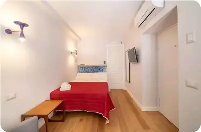 Letto o letti in una camera di Galluppi Studio Flat By HouseinNaples