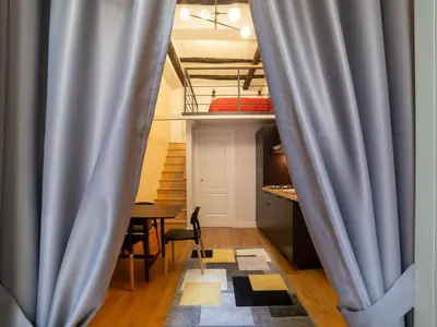 Area soggiorno di Design Studio Flat Next Sorbillo on Tribunali St By HouseinNaples