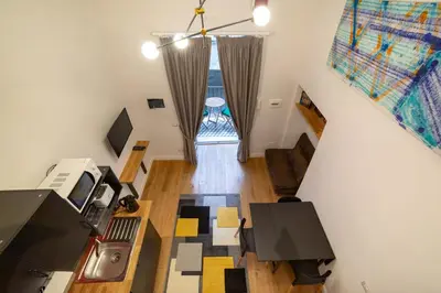 TV o dispositivi per l'intrattenimento presso Design Studio Flat Next Sorbillo on Tribunali St By HouseinNaples