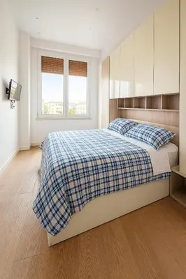 Letto o letti in una camera di Federica's Guest House Vomero, intero appartamento 6 ospiti uso esclusivo vicino metro