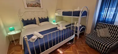 Letto o letti in una camera di Napol-In