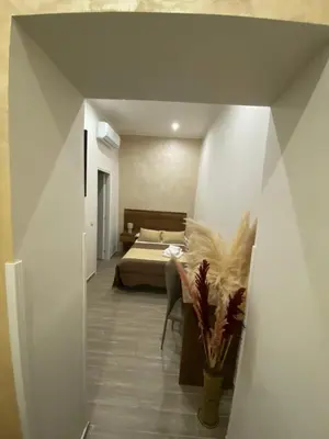 Letto o letti in una camera di La dimora dei borboni