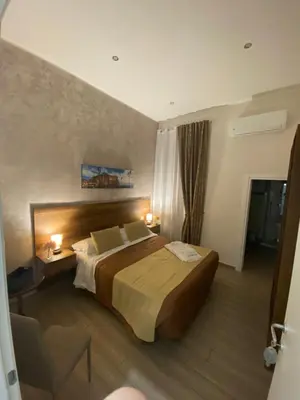 Letto o letti in una camera di La dimora dei borboni