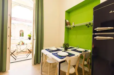 Area soggiorno di N A P Experience Apartments