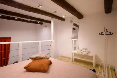 Letto o letti in una camera di Il Palchetto Centralissimo Napoli Old Town