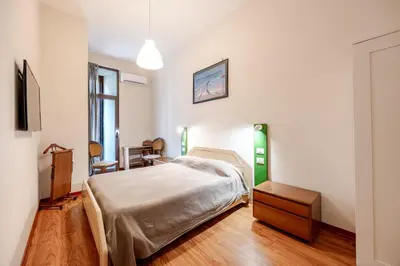 Letto o letti in una camera di Relax in Centro