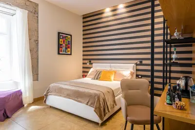 Letto o letti in una camera di Kbirr Charming House